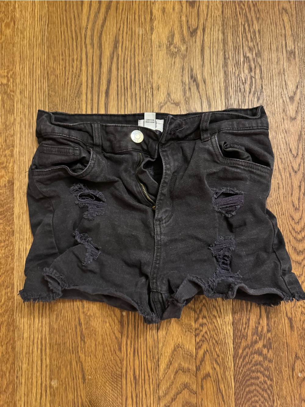 Women’s Black Distressed Denim Cutoff Shorts